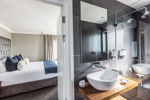 جناح ديلوكس بسرير كينج مع أريكة، Bliss Boutique Hotel 2/2