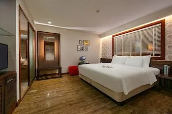 غرفة ديلوكس بسرير كينج، Oriental Suites Hotel And Spa 1/1