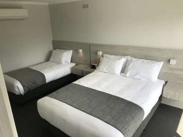 شقة بثلاثة أسرّة وسريرين كوين بـ3 غرف نوم بمطبخ، Seabrook Motel 1/7