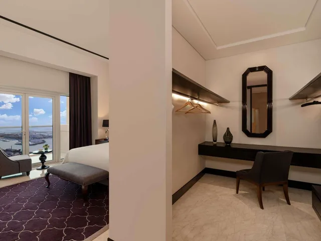 جناح ملكي بسريرين منفصلين وسريرين كينج بـ4 غرف نوم، Rixos Marina Abu Dhabi 4/4