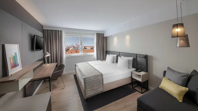 غرفة قياسية بسرير كينج بإطلالة على المدينة، Holiday Inn Munich - City Centre 3/4