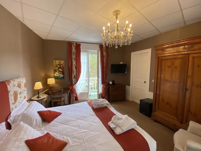 غرفة ديلوكس بسريرين منفصلين، HOTEL LE ROC AU CHIEN 1/8