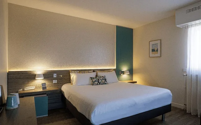 غرفة كلاسيكية ثلاثية بسرير كوين وسرير فردي، HOTEL LES MOUETTES 1/4