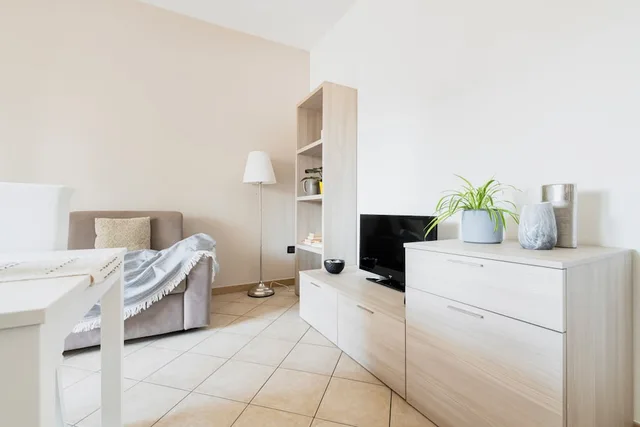 شقة ديلوكس بسرير كوين بشرفة بغرفة نوم واحدة مع أريكة، HQ Aparthotel Milano Inn - Smart Suites 3/8