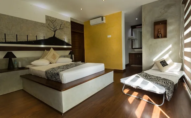 غرفة ديلوكس ثلاثية بسرير كوين وسرير فردي، Winter Villa 3/3