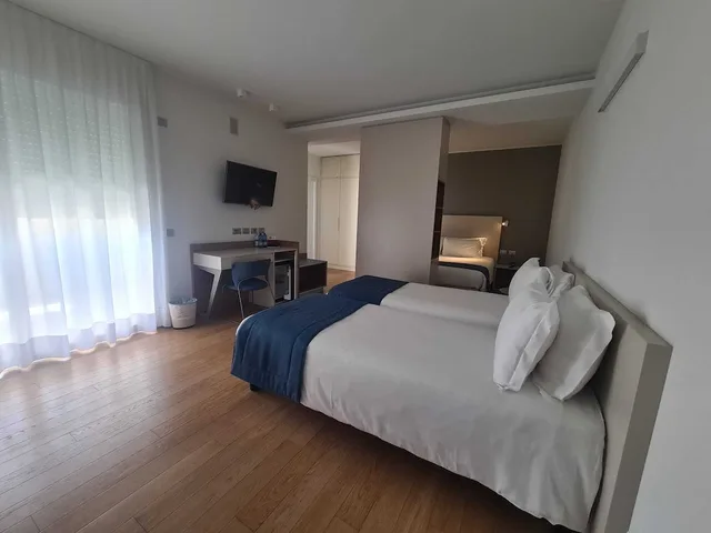 1 Bedroom, Quadruple, King and Twin Beds, Courtyard View, Hesperia Hotel & Residence 1/8