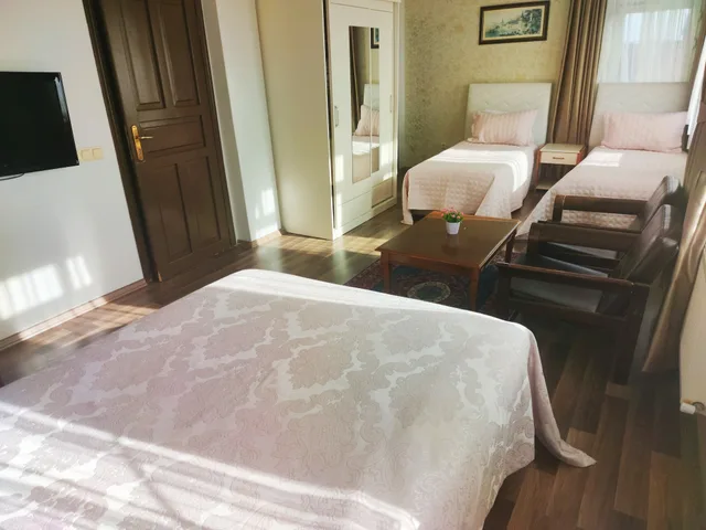 جناح عائلي بسرير كوين وسريرين منفصلين بإطلالة على البحر، Sur Hotel 3/10