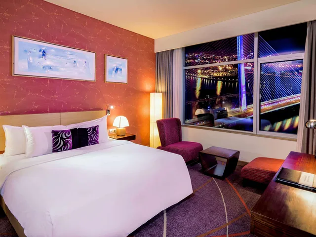 غرفة ديلوكس بريفيليج بسرير كوين بإطلالة على النهر مع دخول الصالة في طابق مرتفع، Grand Mercure Danang 5/6