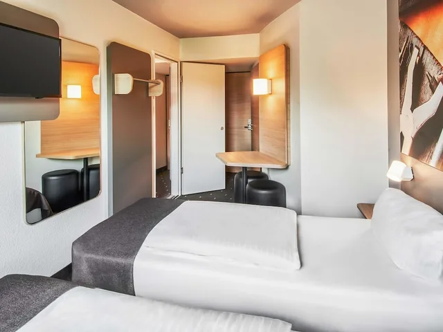غرفة بسريرين منفصلين، B&B Hotel Offenbach-Sud 3/7