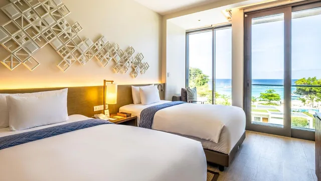 غرفة ديلوكس بسريرين منفصلين بإطلالة على البحر، Crimson Resort & Spa Boracay 1/3