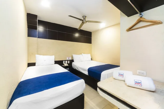 غرفة ثلاثية بسرير مزدوج وسرير فردي، Hotel Kapu 1/4