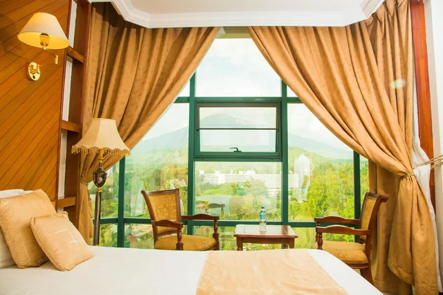 غرفة ديلوكس بسرير كوين، Palace Hotel Arusha 3/3