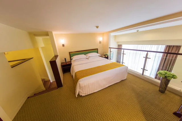 جناح دوبلكس عائلي بسرير كوين وسريرين منفصلين، Yantai Meiya International Apt. Hotel 1/3