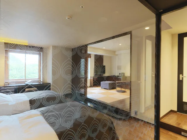 غرفة يابانية غربية ديلوكس بسريرين منفصلين وفرشتي فوتون، Jozankei Tsuruga Resort Spa MORI no UTA 1/1