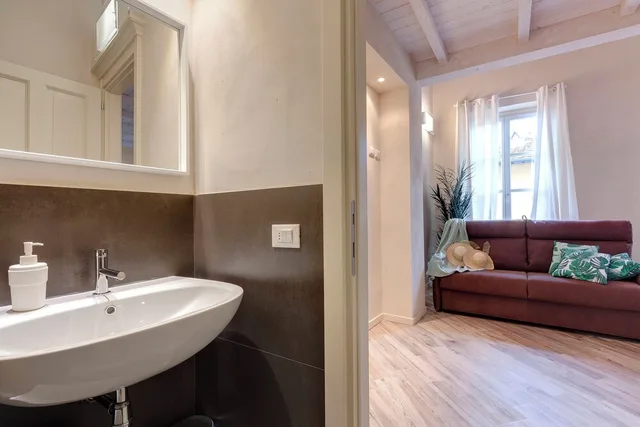 شقة بسريرين مزدوجين مع أريكة، Mamo Florence - Hibisco Apartment 5/10