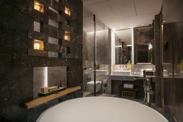 غرفة ديلوكس بسرير كينج وسرير كوين، The Anandi Hotel and Spa Shanghai 3/3