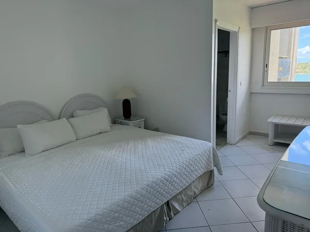 جناح جونيور بسرير كينج وسرير بطابقين بإطلالة على البحر بغرفتي نوم، Sapphire Beach Club and Resort 3/8