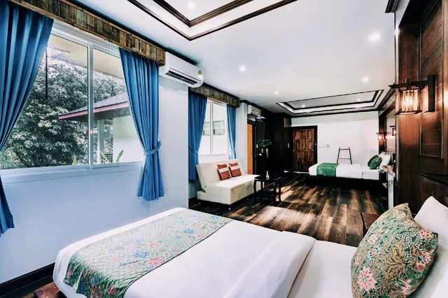 غرفة عائلية بسرير كينج وسرير فردي بإطلالة على الحديقة، Railay Phutawan Resort 9/10