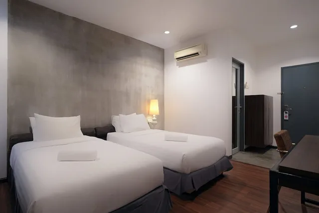 غرفة ديلوكس بسرير مزدوج وسريرين منفصلين، T+ Hotel Sungai Korok 4/7