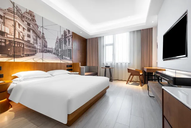 غرفة ديلوكس بسرير كوين، Metropolo Jinjiang Hotels Shanghai Hongqiao National Exhibition Center 1/2