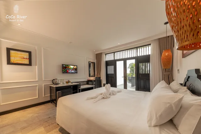 غرفة ديلوكس بسرير مزدوج بإطلالة على الحديقة، Hoi An Coco River Resort Spa 1/3
