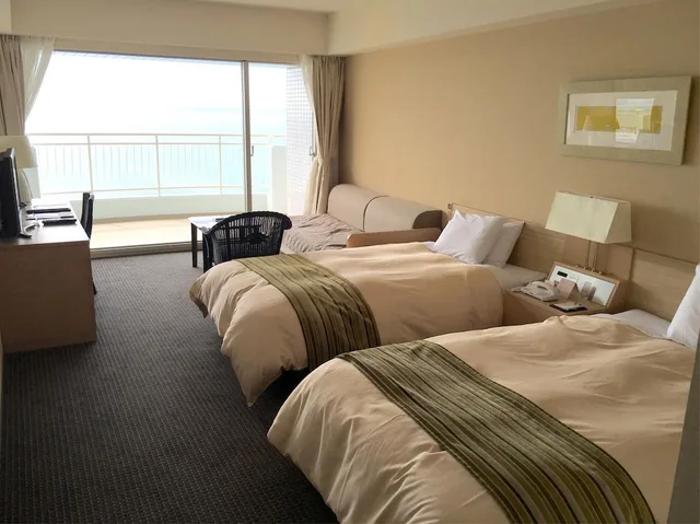 غرفة ثلاثية بثلاثة أسرّة بإطلالة على البحر، Hotel Harvest Nankitanabe 3/10