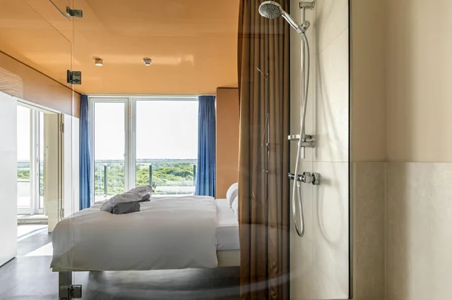 Suite, Lateral Side Sea View, Balcony, a-ja Warnemuende. Das Resort 3/4