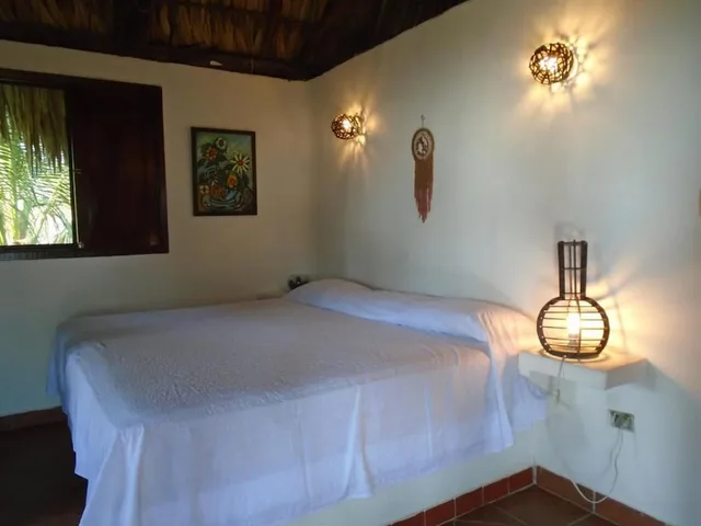 غرفة رباعية بسرير كينج وأسرّة بطابقين بإطلالة على البحر، Marbella Eco Lodge 4/4