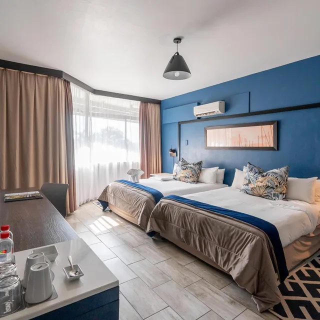غرفة بسرير مزدوج أو سريرين منفصلين، Indaba Lodge Hotel Richards Bay 4/7