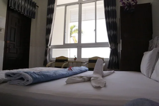 غرفة رباعية بسريرين مزدوجين، Minh Hung Hotel 2/8