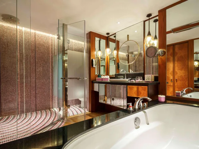 غرفة بسرير كينج بإطلالة على الحديقة، Sofitel Singapore Sentosa Resort and Spa 5/5