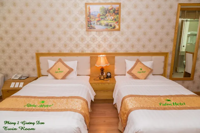 غرفة ديلوكس بأربعة أسرّة وسريرين منفصلين، Palm Hotel Thanh Hoa 1/2