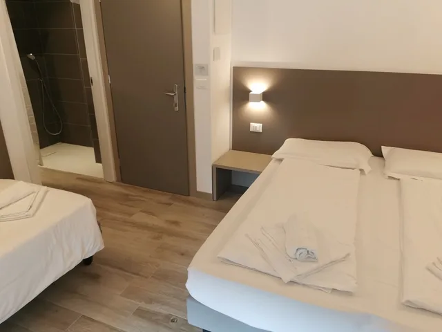 غرفة أساسية ثلاثية بسرير مزدوج وسرير فردي، Albergo Ristorante Sonia 1/4