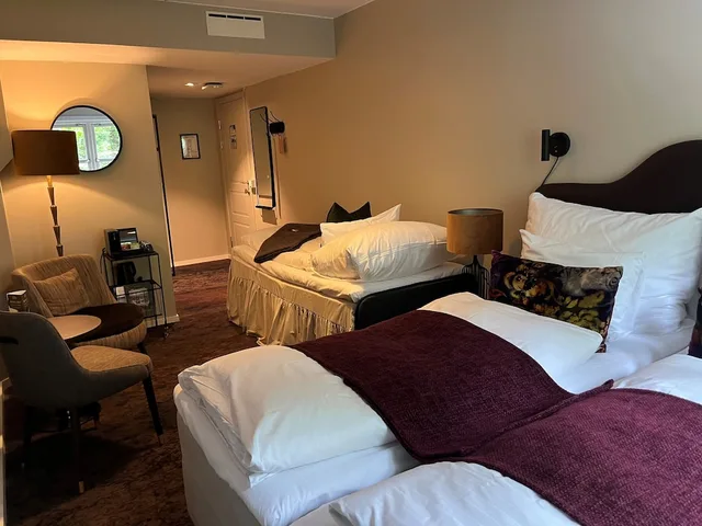 غرفة كلاسيكية ثلاثية بسرير كينج وسرير فردي، Molla Hotel 3/7