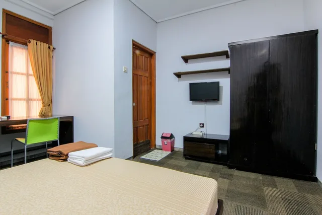 غرفة قياسية بسرير مزدوج، Embe Enem Homestay by ZUZU 2/4