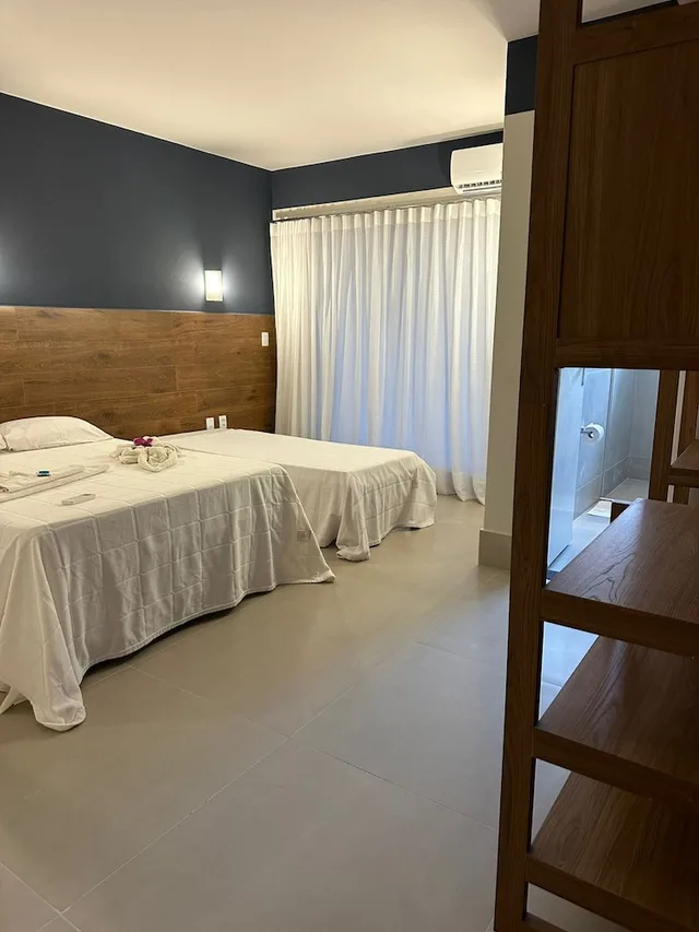 غرفة ديلوكس رباعية بسرير مزدوج وسريرين منفصلين بشرفة، Hotel Paraiso Tropical 2/3