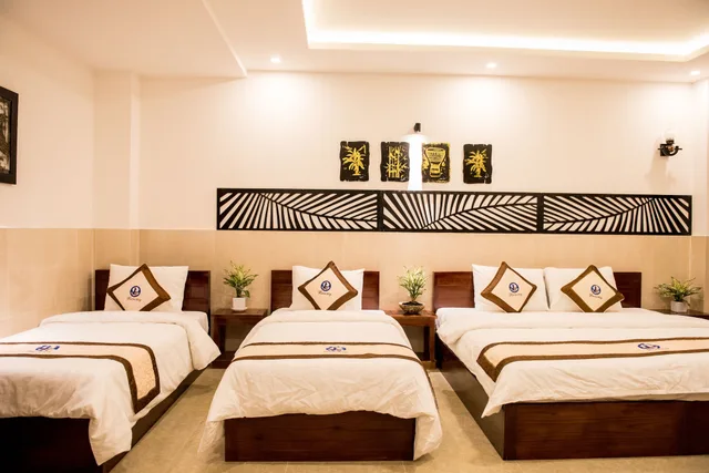 غرفة عائلية بسريرين كينج وسرير فردي، Ngo House 2 Villa 3/8