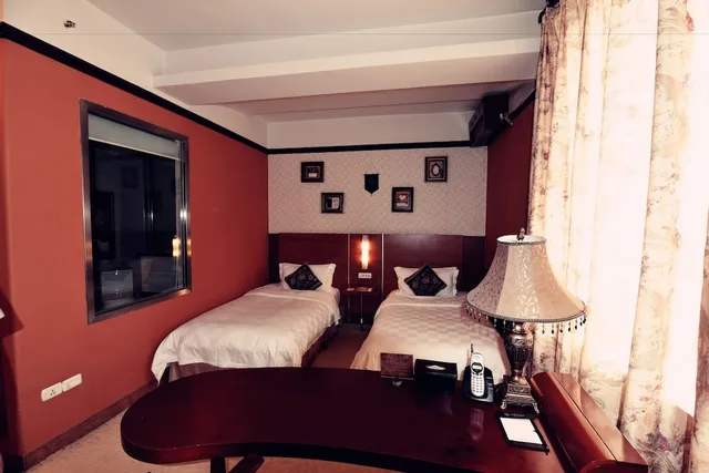 غرفة فاخرة بسريرين منفصلين بغرفة نوم واحدة، Haerbin Bremen Grand Hotel 1/2