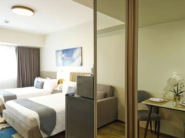 Bay Suite, Family, 2 Queen Beds، Savea Bay City Manila 4/8