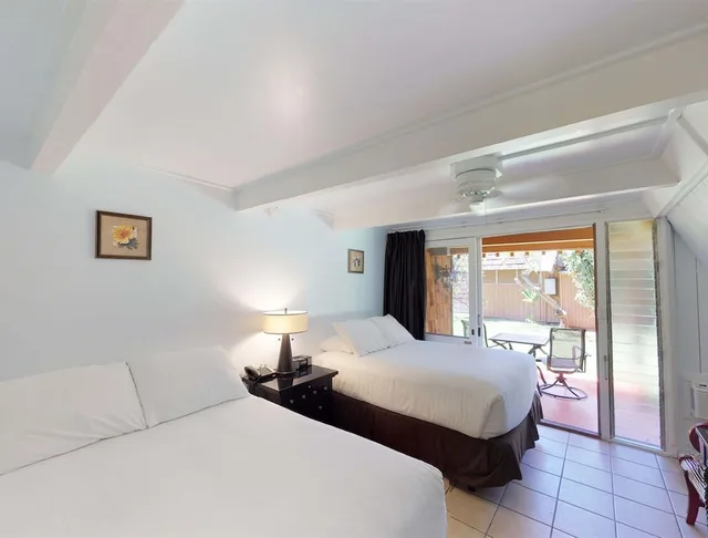 غرفة بسريرين مزدوجين بإطلالة على الحديقة، Hotel Moloka I 1/5