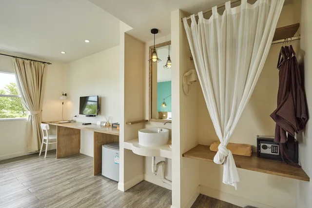 غرفة ديلوكس بسرير مزدوج، Talay Hotel & Villa 4/5