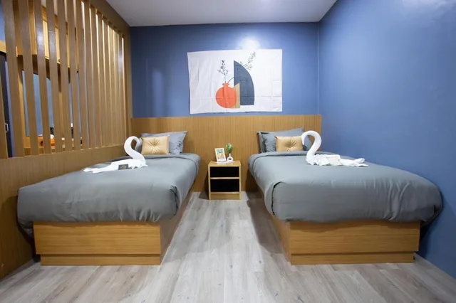 غرفة بسريرين منفصلين بإطلالة على الجبل، The Sun Resort 1/2