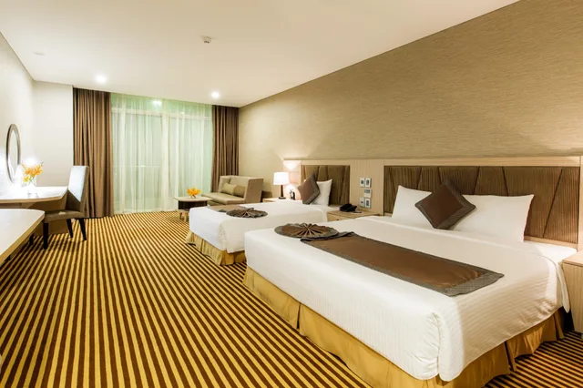 غرفة ديلوكس عائلية ثلاثية بسرير كينج وسرير فردي، Muong Thanh Luxury Khanh Hoa Hotel 2/3