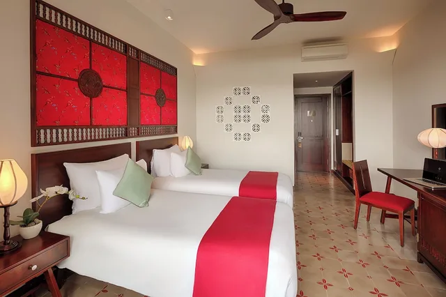 Grand, Twin Beds, Pool and River View، RiverTown Hoi An Resort & Spa 1/10