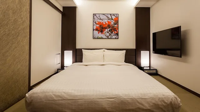 جناح غراند بريميير تنفيذي بسريرين منفصلين مع أريكة مع دخول الصالة، Okinawa Kariyushi Resort Exes Naha 1/6