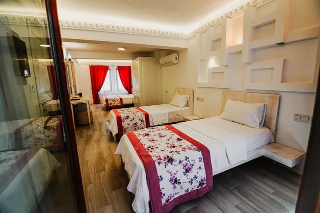 غرفة اقتصادية رباعية بسرير مزدوج وسريرين منفصلين، Aksoy Butik Otel 3/4