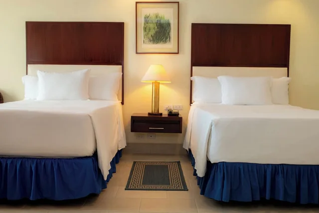 غرفة بسريرين مزدوجين بإطلالة على البحر، Barcelo Colon Miramar 5/7