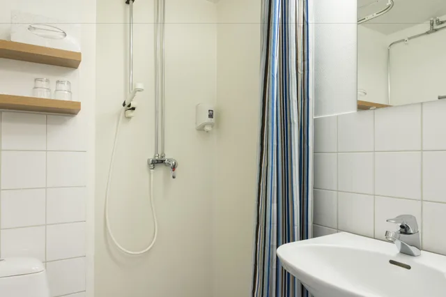غرفة عائلية بسريرين منفصلين مع أريكة، Hotell Björken 7/9