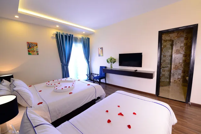 غرفة سوبيريور ثلاثية بسرير كوين وسرير فردي، TTC Hotel Hoi An 6/10