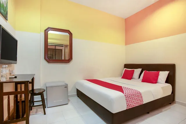 غرفة ديلوكس بسرير كوين، OYO 43933 Ferringhi Stay Iinn 1/5